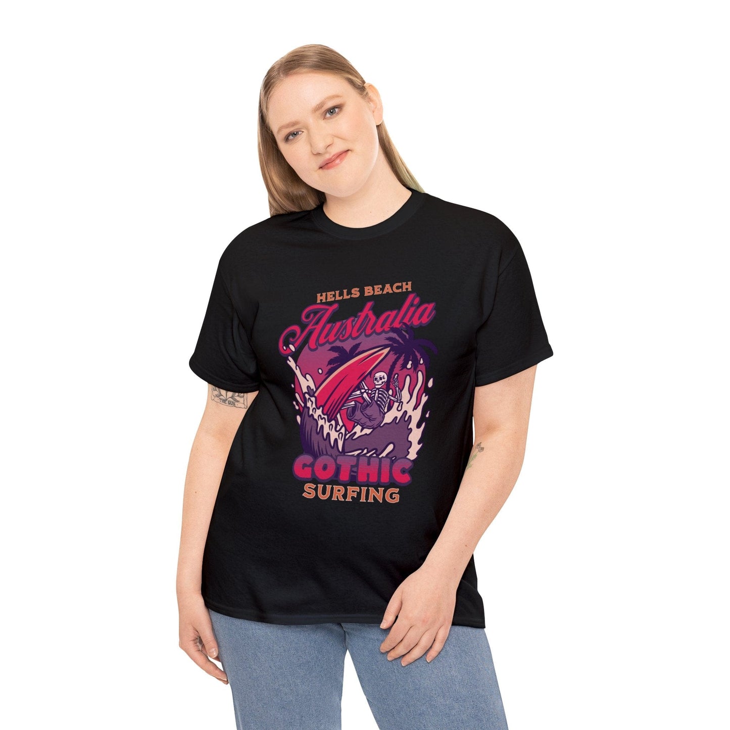 women's Hells Beach Australia Gothic Surfing black Gildan 5000 t-shirt in reds, purples, halloween oranges featuring a board short wearing skeleton catching a wave under a full moon