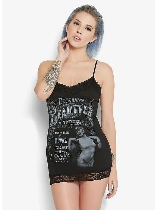 alternative woman wearing the Deceiving Beauties Lace Trimmed cotton gothic cami from Se7en Deadly the elegantly macabre clothing brand in California, now stocked at Gallery Serpentine