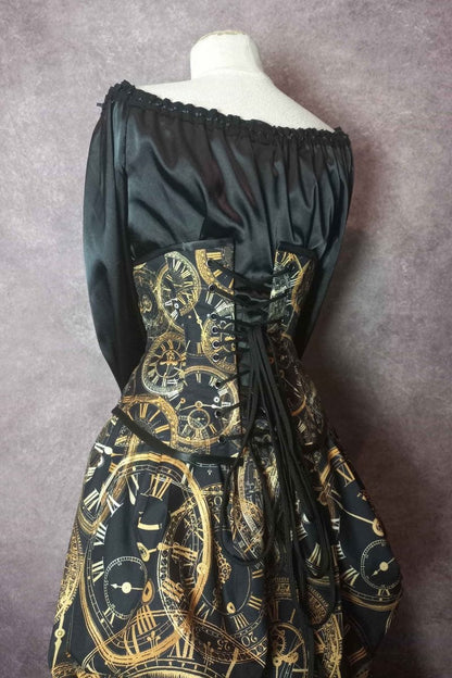 close up on the back view of the corset in the elegant steampunk victorian bustle skirt and corset set from Gallery Serpentine featuring custom made clock fabric