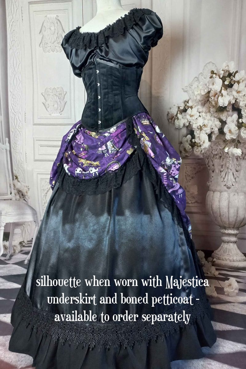 victorian bustle high low skirt made from custom designed purple alice in wonderland fabric worn with a boned petticoat underneath