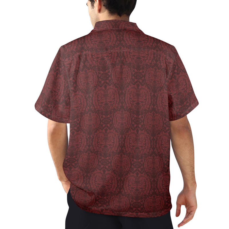 Man wearing a patterned red shirt on a white background