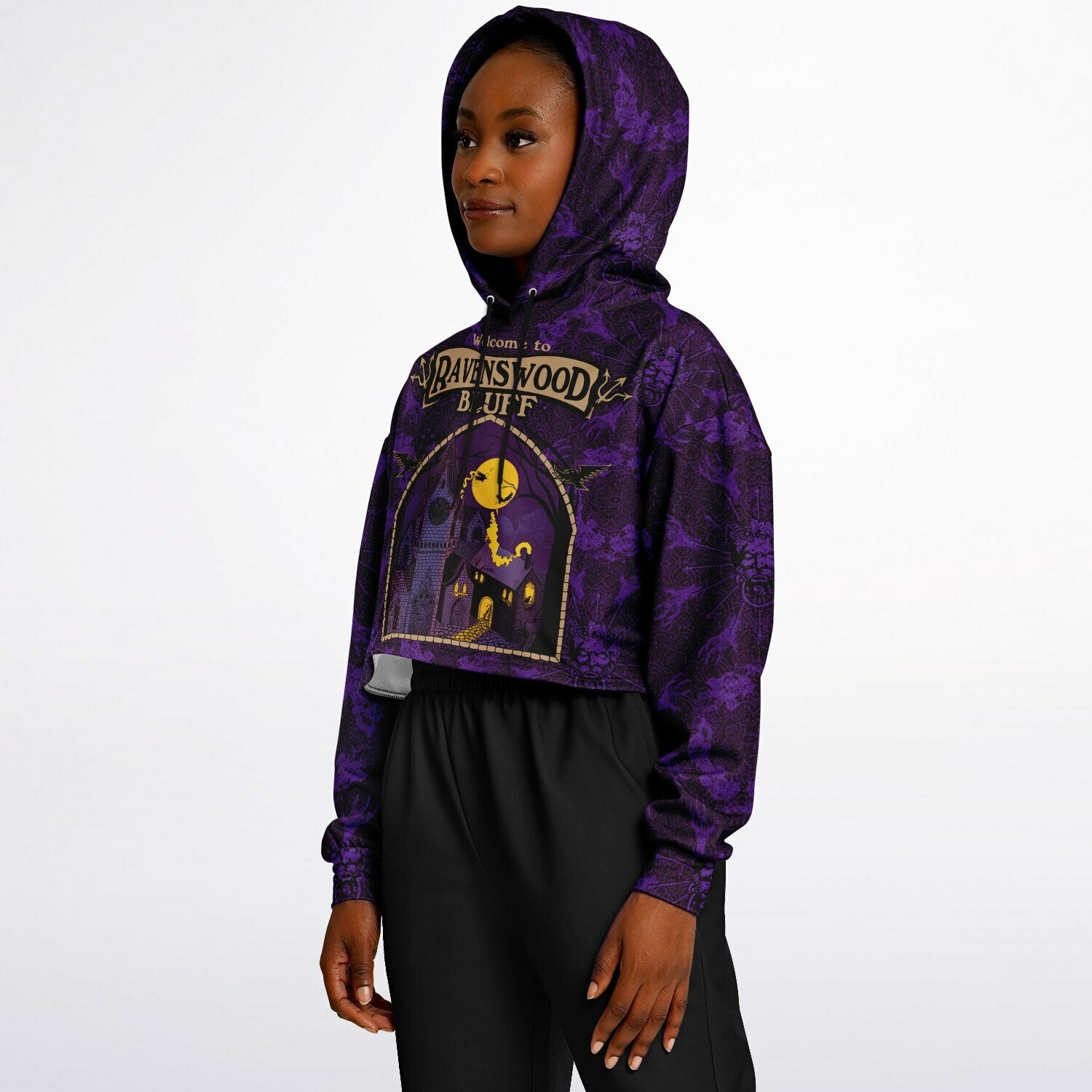 cropped short hoodie for Blood on the Clocktower fans featuring a portal view into the mythical setting of the boardgame, Ravenswood Bluff and a Welcome sign 5