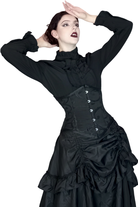 Woman wearing a black Victorian-style dress on a white background