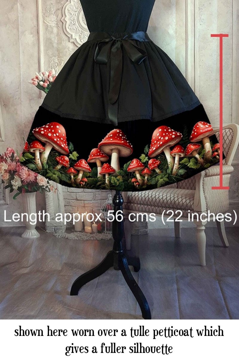 bright red toadstools cottage core mushroom core mid length skirt with length measurement given of 56cm as text overlay