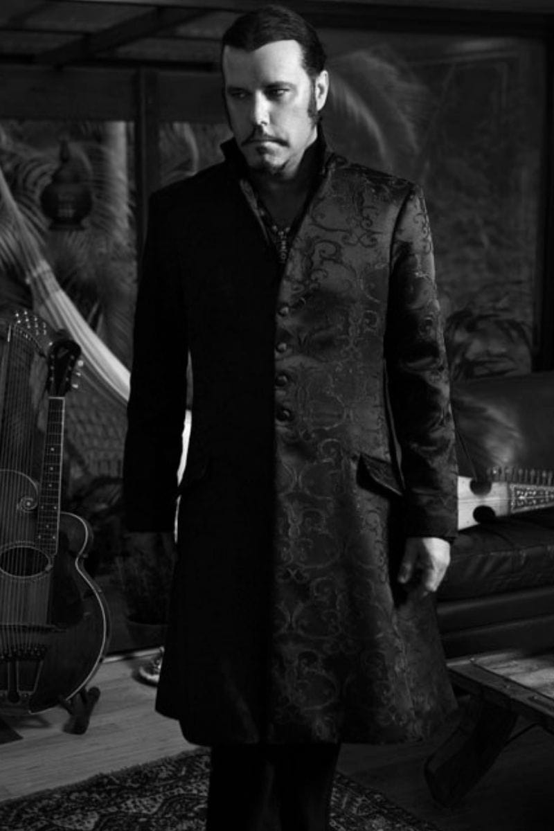 black & white image showing alt rock musician Jeff Martin from The Tea Party wearing The Under Taker Coat by Gallery Serpentine