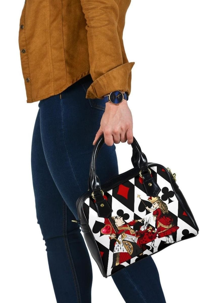 side view of the black red white Queen of Hearts Alice in Wonderland handbag