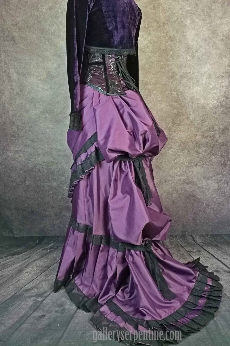 1880s era cascade bustle back on the gothic victorian steampunk wedding skirt in amethyst satin