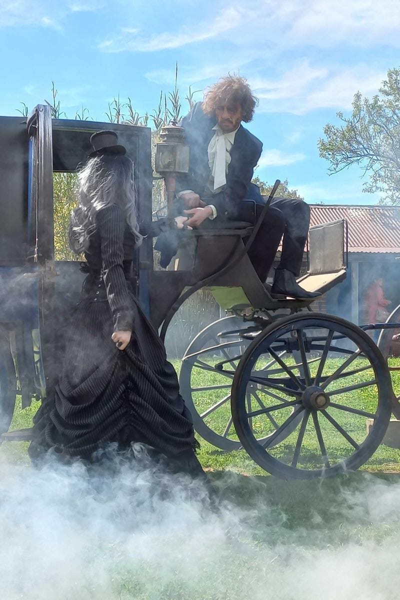 spooky gothic victorian wedding image of gothic bride and groom with carriage 