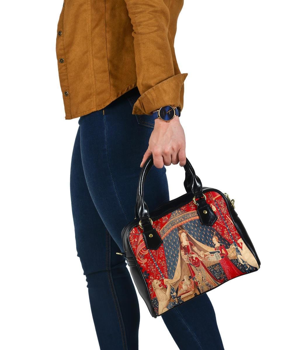 side view of the The Lady & the Unicorn medieval tapestry artwork printed on a vegan leather women's handbag