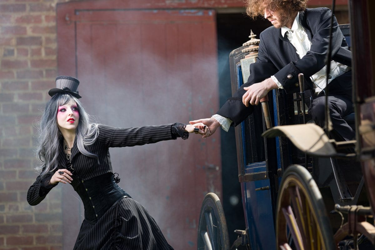 gothic victorian couple dressed in Gallery Serpentine for their wedding shoot