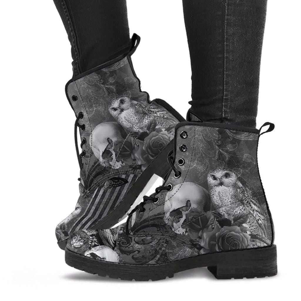 gothic woman's legs walking in the vegan boots printed with gothic animals - owl, raven, skull