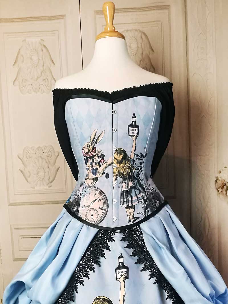 close up on the cute Alice in Wonderland characters on the Australian made steel boned corset