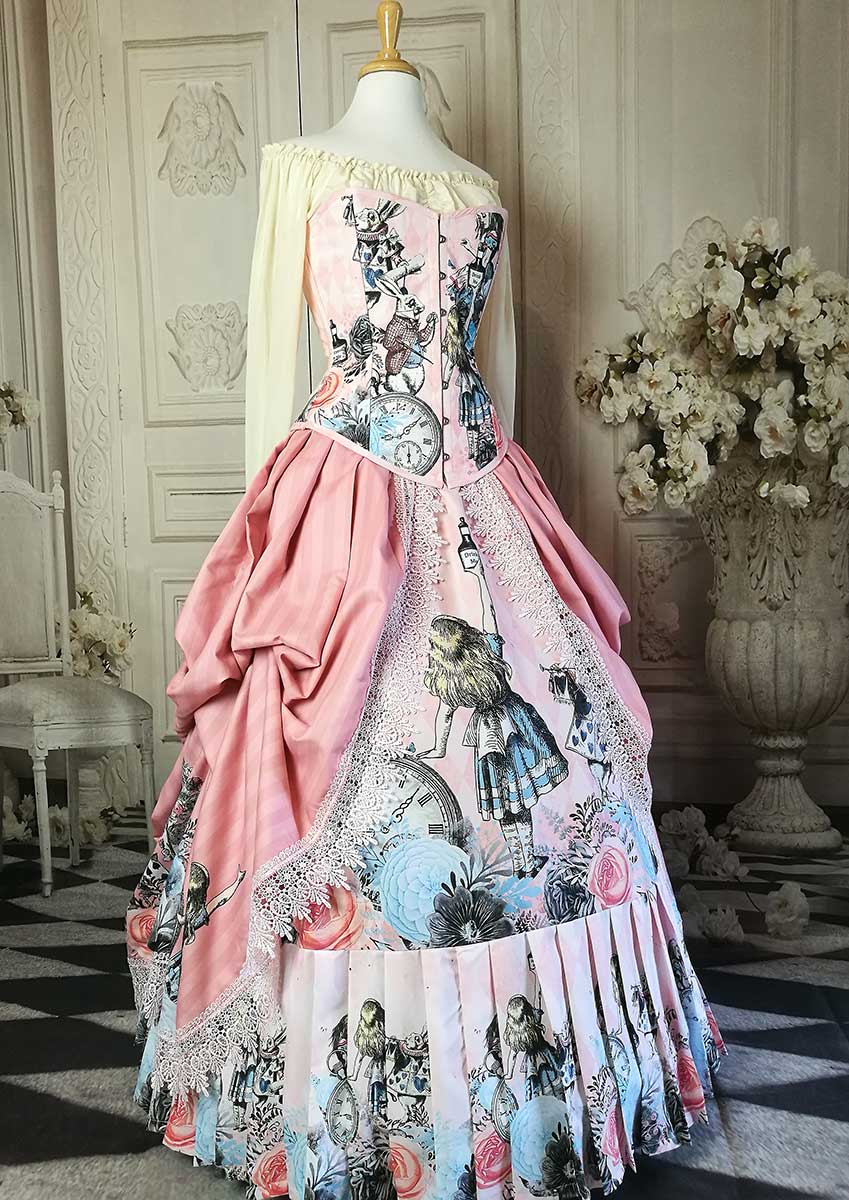 front side view showing the under skirt of the Pink victorian themed Alice in Wonderland wedding dress made in Australia