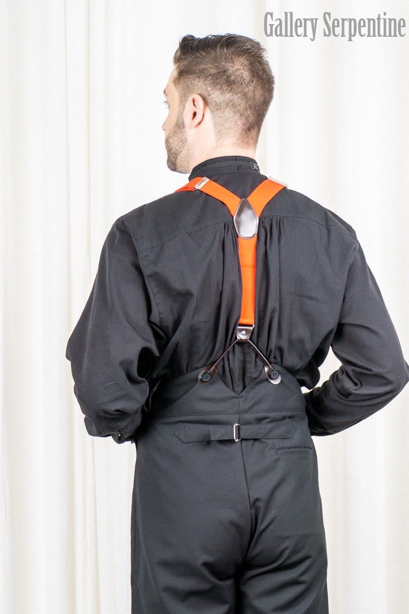 back of the high waisted Tombstone trousers worn with red button on suspender braces