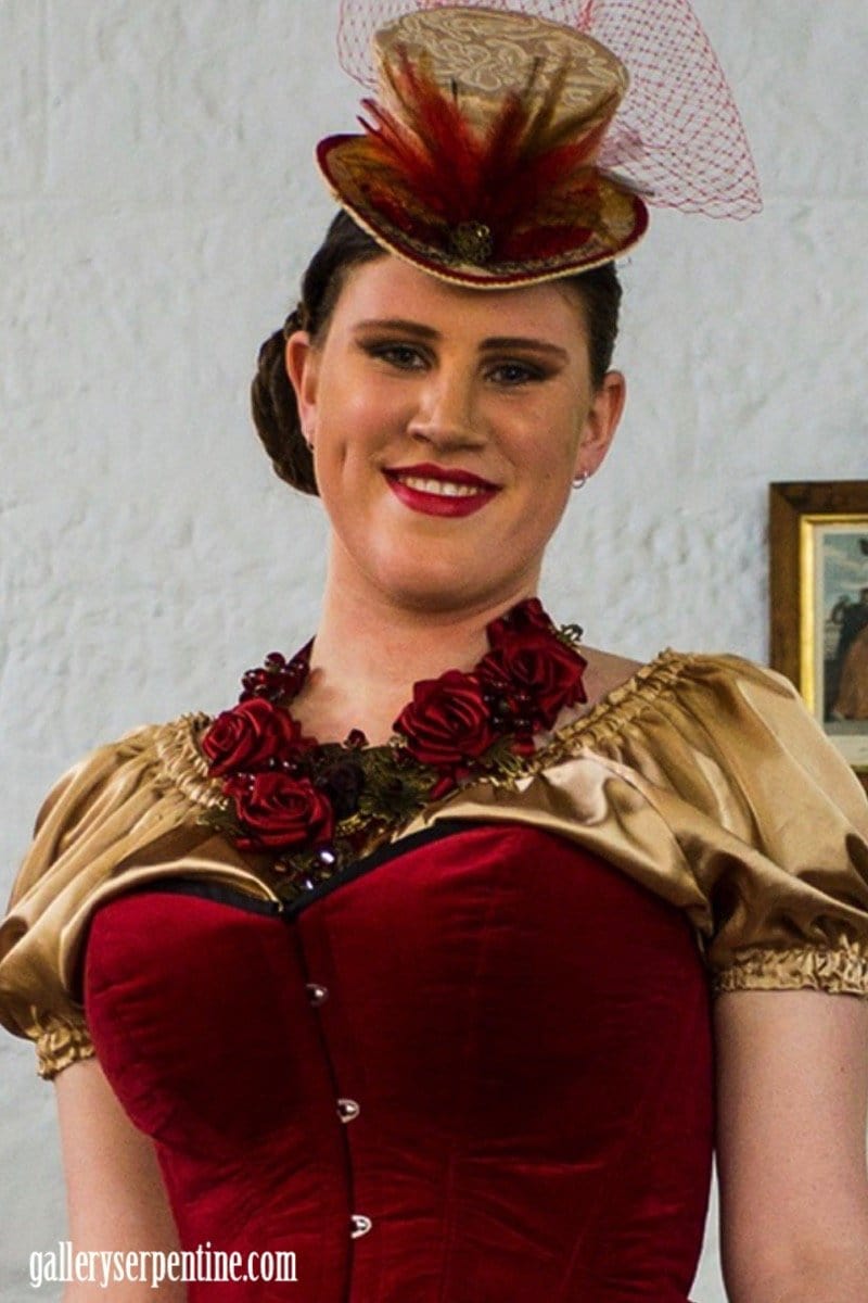 close up on the supportive bust cup area of the red velvet Australian made steel boned corset