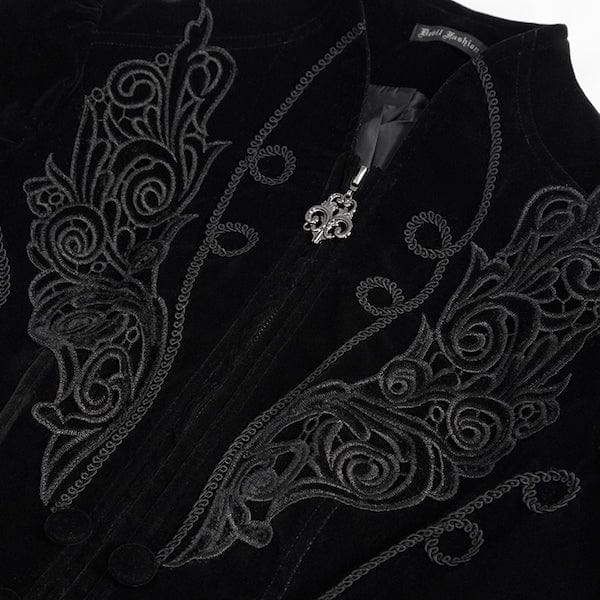 close up detail showing the elegant embroidered applique and ornate zipper puller on the Black velvet gothic victorian fitted women's jacket at Gallery Serpentine