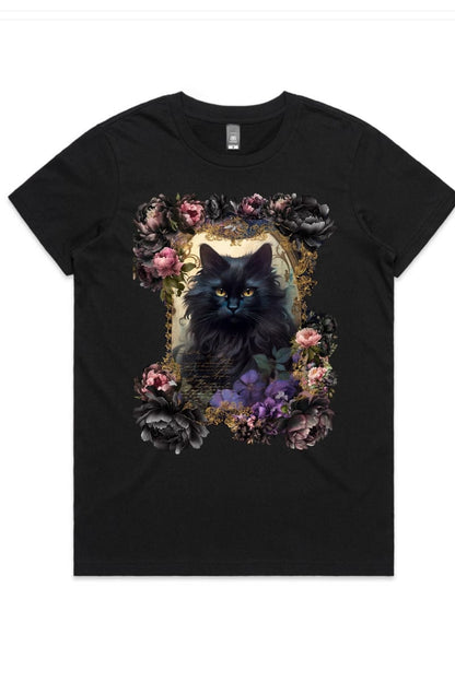 flat lay of Black fluffy cat surrounded by a midnight garden of peonies and dark florals on a quality AS Colour Maple T-shirt from Gallery Serpentine