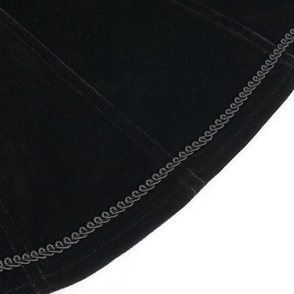 close up on the braid trim at the hem of the Black velvet gothic victorian fitted women's jacket at Gallery Serpentine