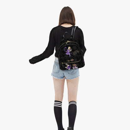 college student wearing the black damask patterned mini backpack featuring Alice in Wonderland characters in purples and lilacs with a famous Alice quote
