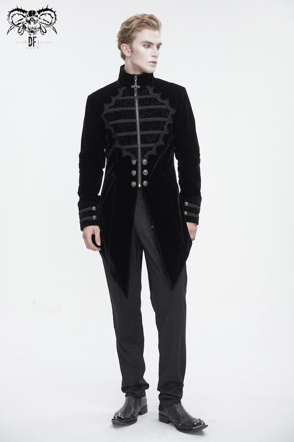 GOTHIC GROOM WEARING THE GOTHIC CHAOS MAGIC TAILCOAT IN BLACK VELVET WITH STRONG TAILORING AND ORNATE BRAID AND BUTTON DETAILS FROM DEVIL FASHION AT GALLERY SERPENTINE FOR HIS WEDDING OUTFIT