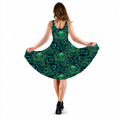 back view of the The legend of Lovecraft vibrant dark green printed polyester velvet Cthulhu dress with pockets at Gallery Serpentine