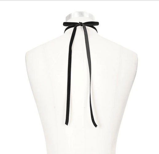showing the length of the black velvet ribbon on the Gothic bejewelled cravat for women featuring black eyelash lace and a smoky jewell for bringing gothic elegance to a shirt