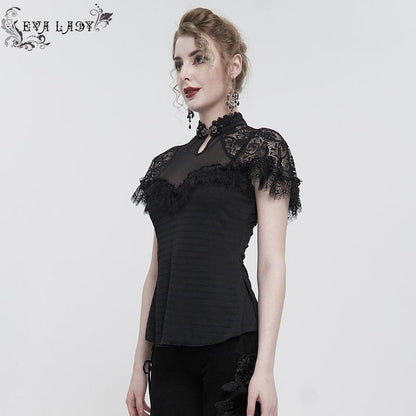 side front view of the Gothic Elegance women's top made from textured lace, mesh, eyelash lace trim and soft polyester spandex. Features a jewelled silver clasp at the neck