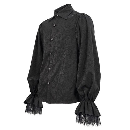 side front view of the archetypal goth clubbing shirt in black embossed paisley with lace at cuffs and rows of black braid across the shoulders, features ornate domed buttons
