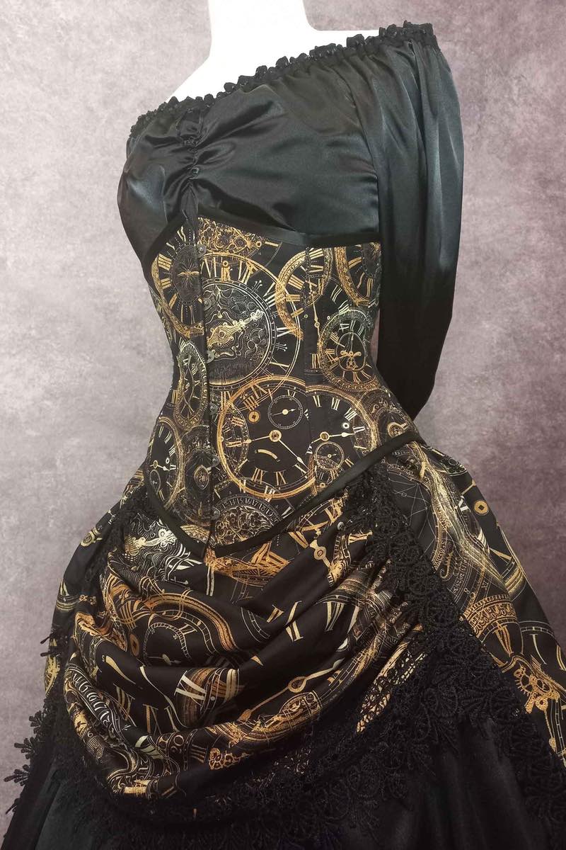elegant steampunk victorian bustle skirt and corset set from Gallery Serpentine featuring custom made clock fabric showing the tightlacing corset
