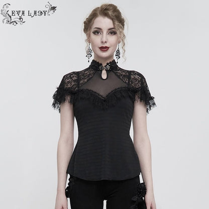 Gothic Elegance women's top made from textured lace, mesh, eyelash lace trim and soft polyester spandex.  Features a jewelled silver clasp at the neck. Worn by a gothic woman for a night out.