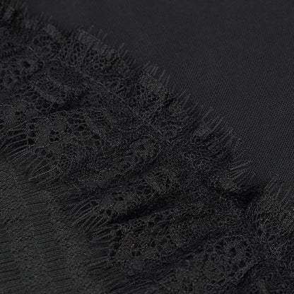 close up on the eyelash trim that joins the mesh and the body fabric of the Gothic Elegance women's top made from textured lace, mesh, eyelash lace trim and soft polyester spandex. Features a jewelled silver clasp at the neck