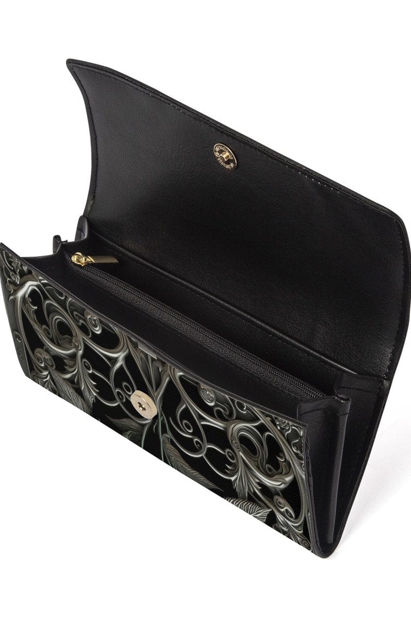 close up on the open silver baroque scrolls and roses clutch purse
