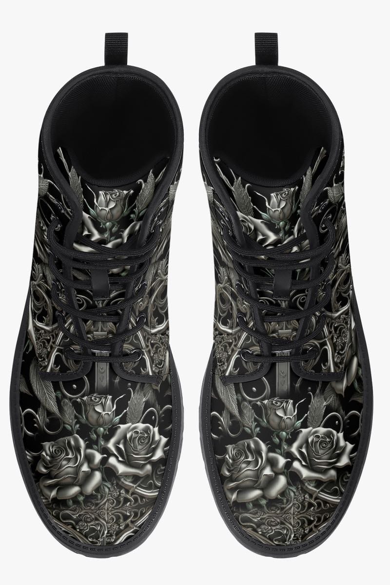 front toe view of the gothic black and silver filigree patterned vegan leather boots with silver roses at Gallery serpentine