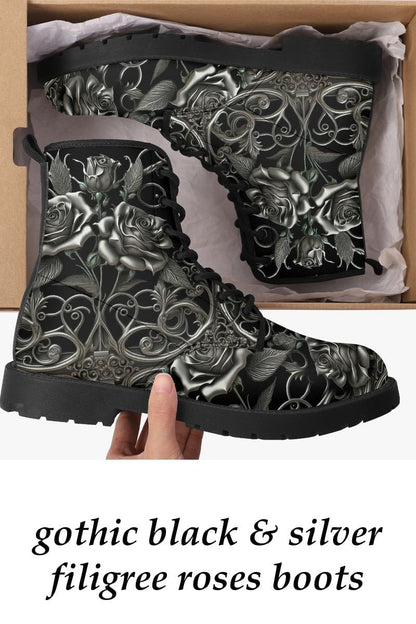 unboxing the gothic black and silver filigree patterned vegan leather boots with silver roses at Gallery serpentine