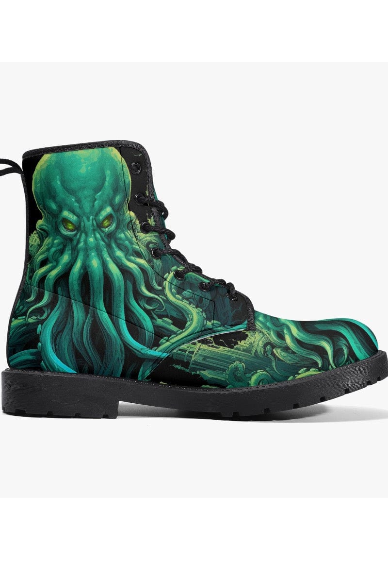 side view of the mighty deep vibrant green and black Cthulhu sea monster on a vegan leather boot at Gallery Serpentine