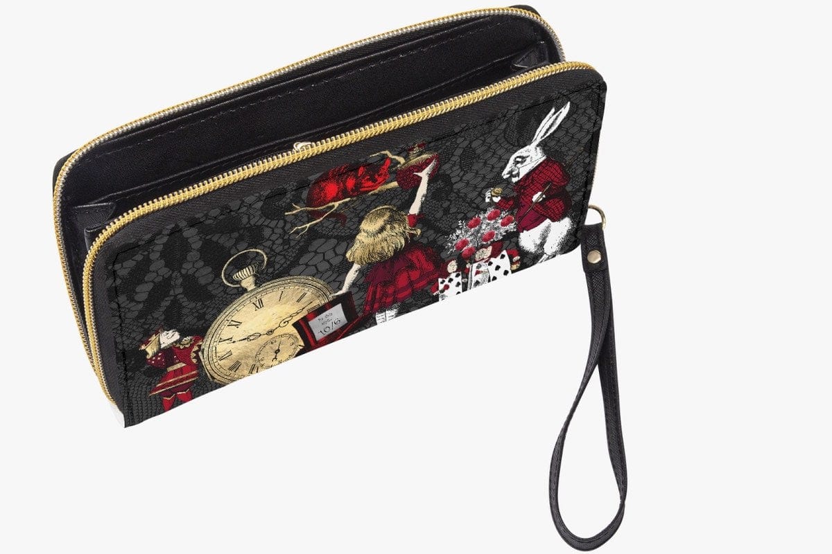 close up on the red gold and black alice in wonderland zipped purse wallet featuring the characters of the story on a black lace print background with zip open