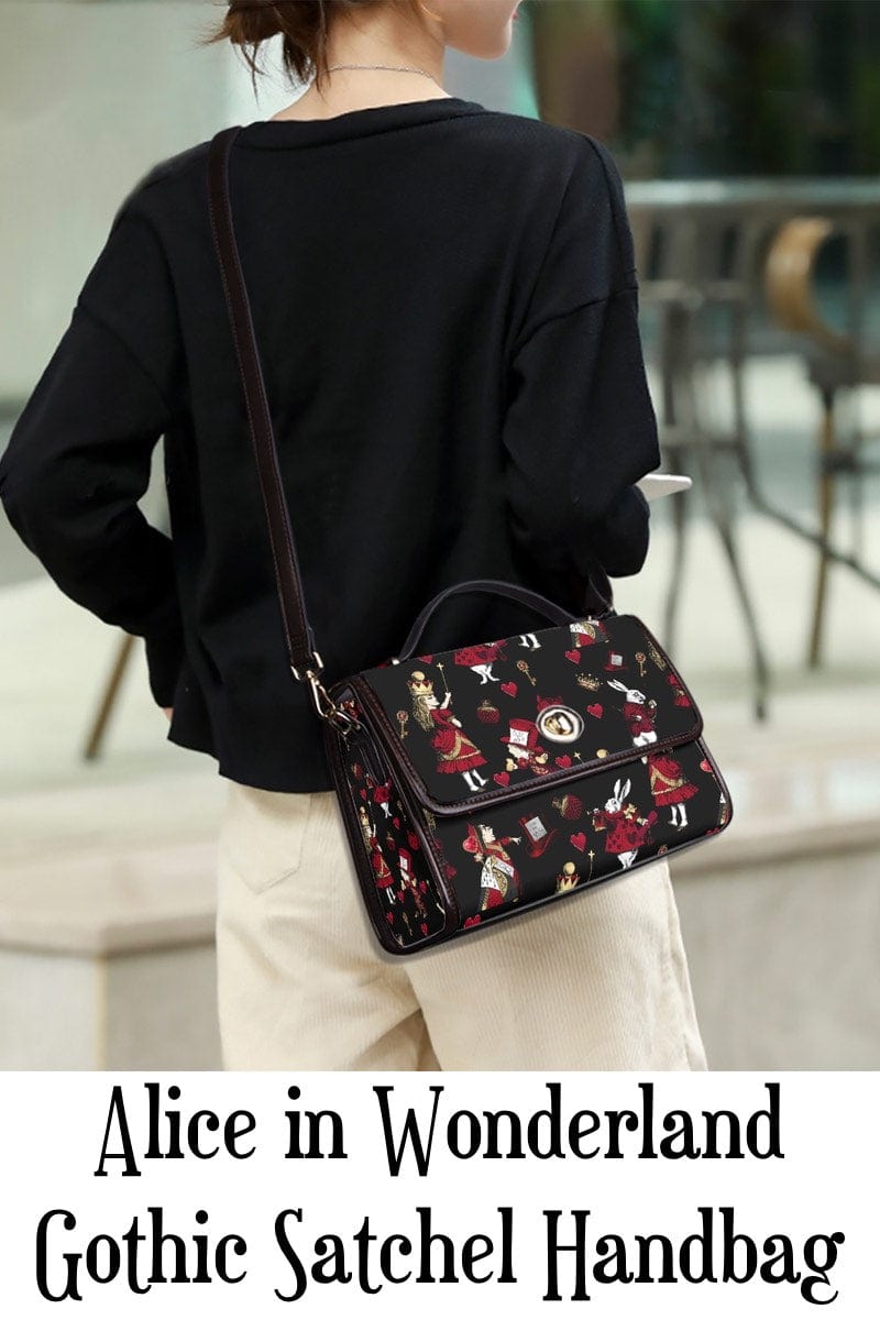 instagram influencer wearing the black red gold alice in wonderland gothic satchel handbag