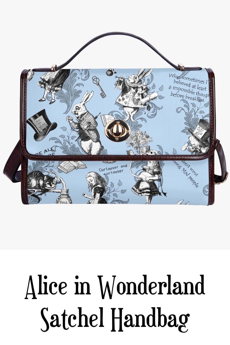 front view of the Alice in Wonderland whimsical blue satchel handbag printed with quotes and characters from the book