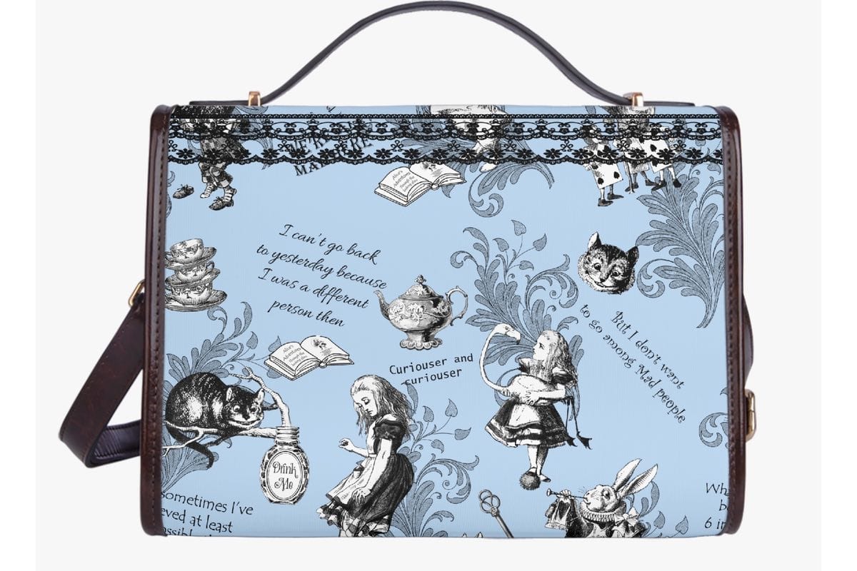 back view of the Alice in Wonderland whimsical blue satchel handbag printed with quotes and characters from the book