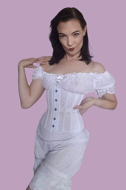 Burlesque performer and swordswoman La Petite Morticia wearing Undercover Angel white mesh waist training corset by Gallery Serpentine 2