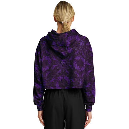 cropped short hoodie for Blood on the Clocktower fans featuring a portal view into the mythical setting of the boardgame, Ravenswood Bluff, back view on blonde woman