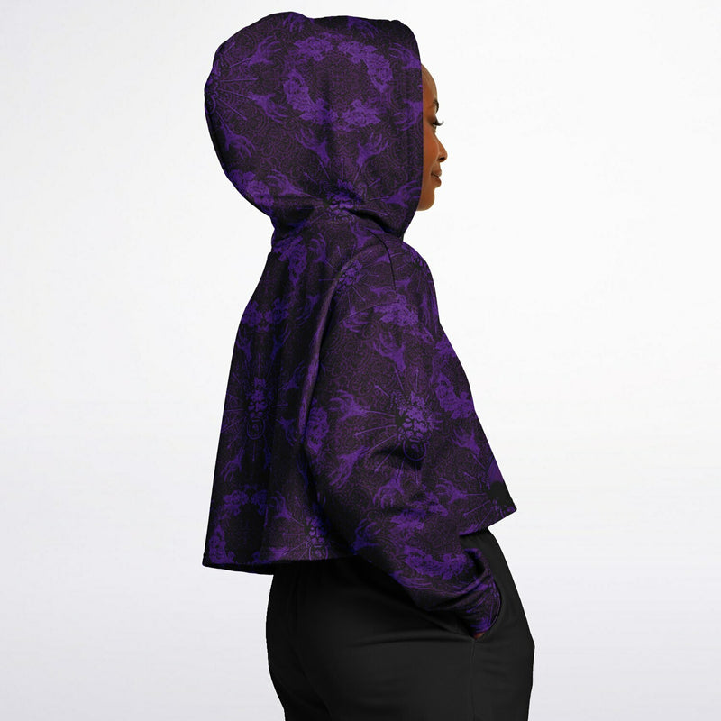 cropped short hoodie for Blood on the Clocktower fans featuring a portal view into the mythical setting of the boardgame, Ravenswood Bluff side view on happy botc player