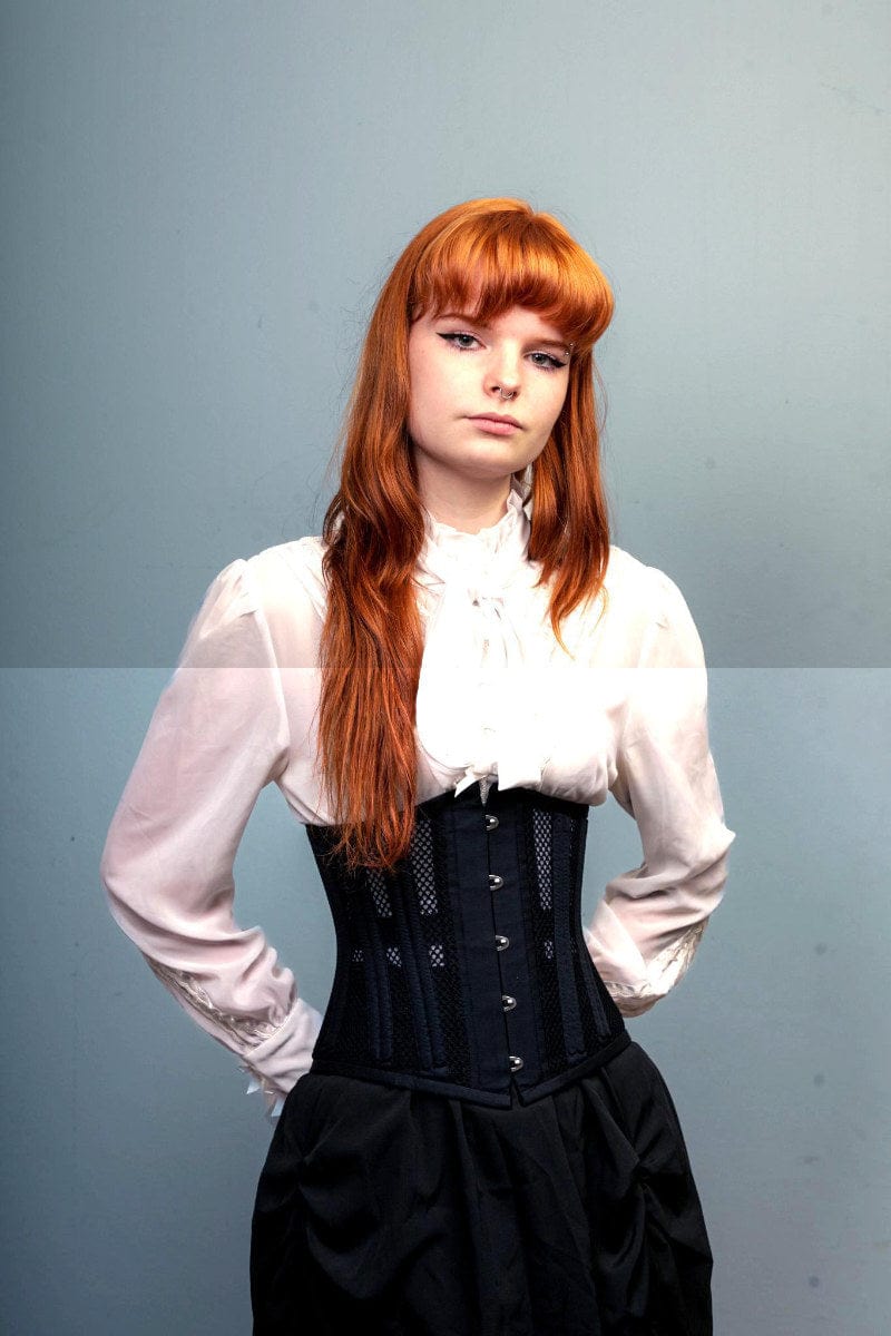 Keeva wears the Waist Control double boned mesh and cotton waist training corset from Gallery Serpentine