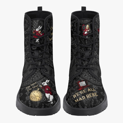 front view showing the printed tongues of the gothic Alice in Wonderland faux leather boots featuring a gothic lace background and Alice Quotes