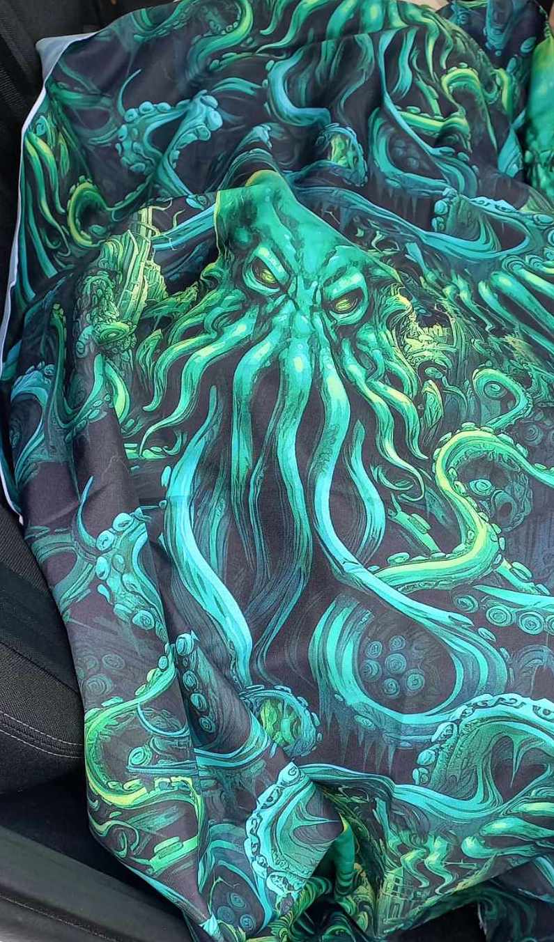 the vibrant green custom designed and made Cthulhu fabric used in the Gallery Serpentine Call of Cthulhu corset gown