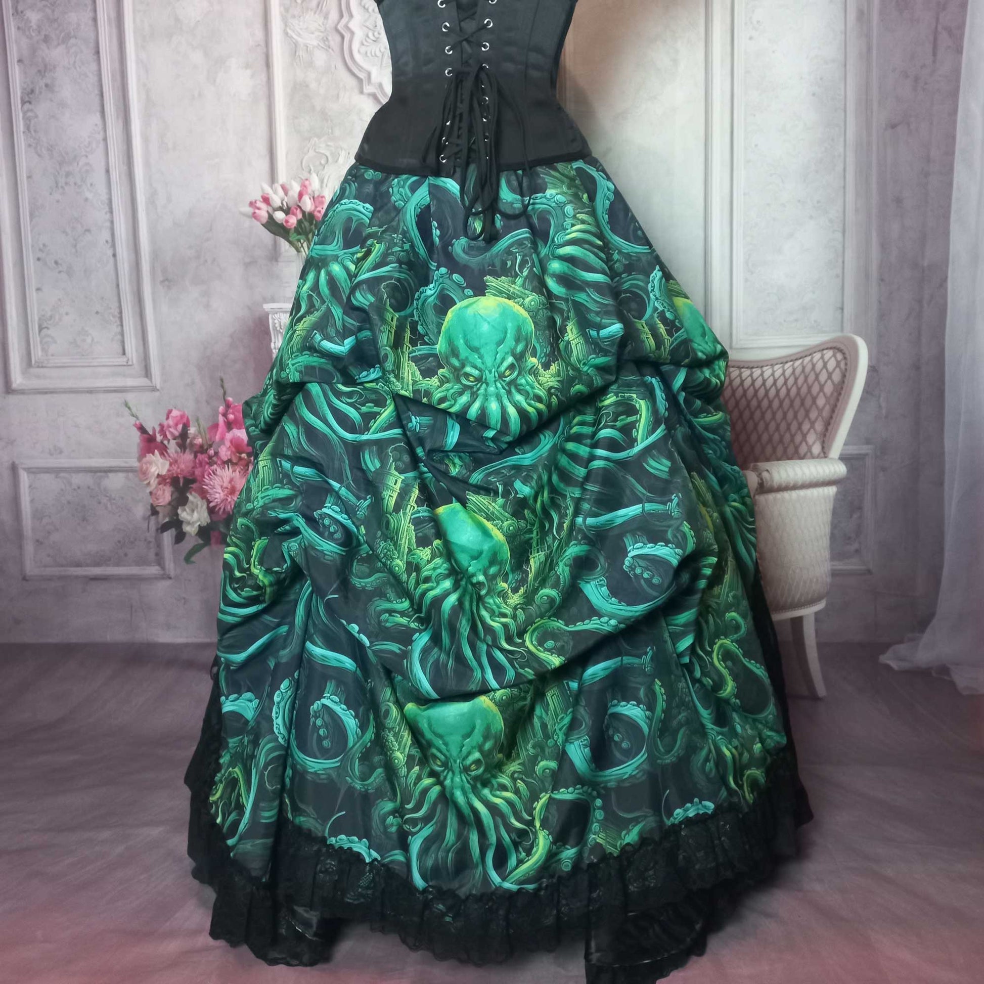 Call of Cthulhu victorian high low bustle skirt, made to measure in Australia worn over a petticoat and with a corset, back view