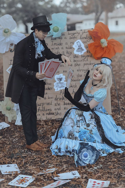 bride and groom in Alice in Wonderland themed wedding outfits by Gallery Serpentine