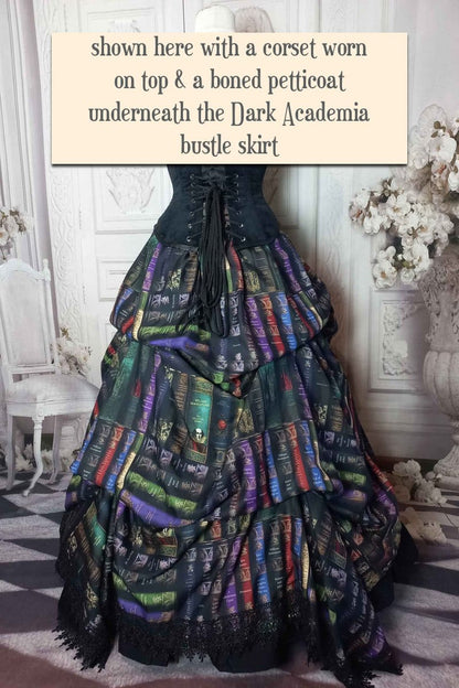 back view of the dark academia gothic victorian bustle skirt made in Australia featuring book spines from Poe Shakespeare Austen worn with a boned petticoat underneath for a fuller silhouette