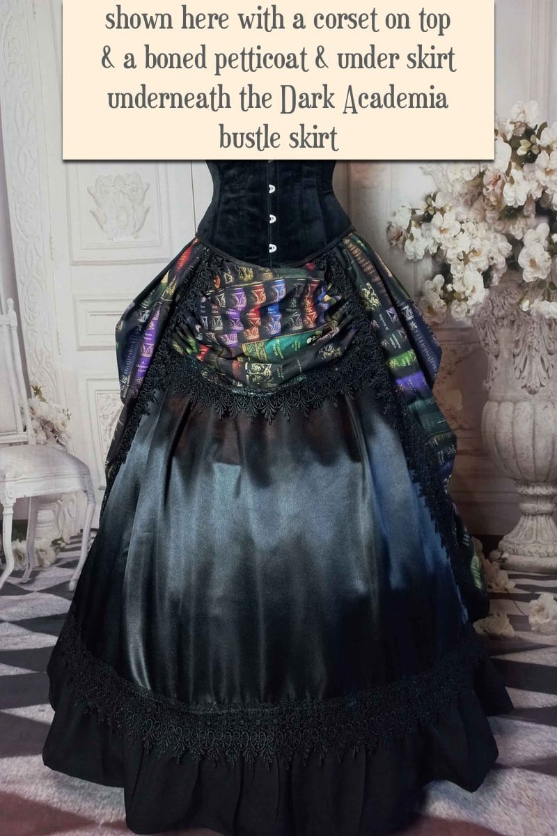 front view of the dark academia gothic victorian bustle skirt made in Australia featuring book spines from Poe Shakespeare Austen worn with a boned petticoat underneath for a fuller silhouette