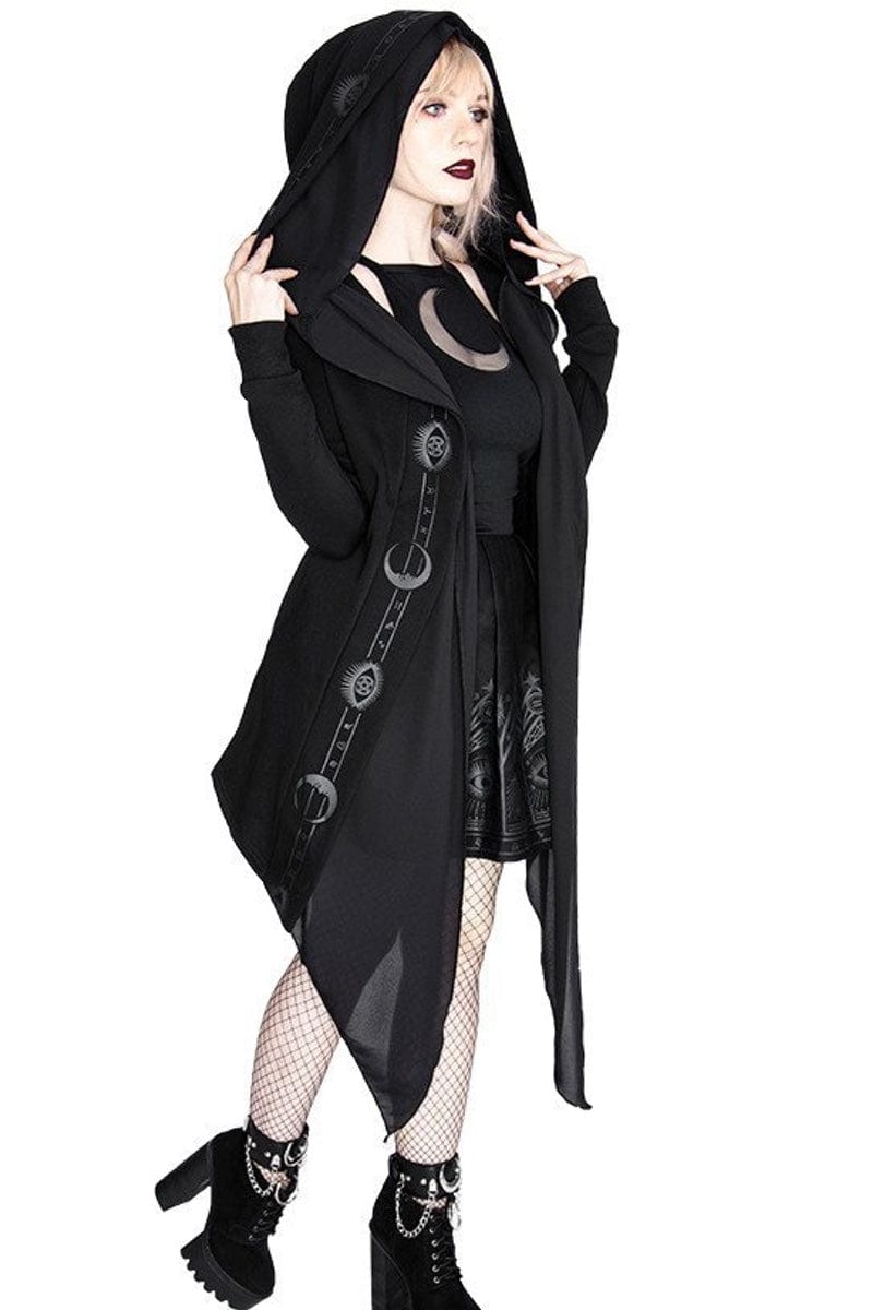 blonde gothic woman in the black gothic pagan witch hoodie with moon symbols and oversized hood